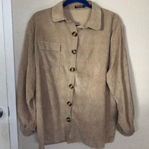 Buttoned up, long shirt.